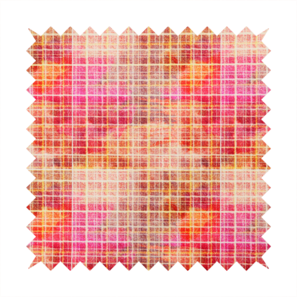 This fabric features an intricate, layered plaid pattern that blends warm tones of red, orange, yellow, and deep pink. The design has a slightly blurred, watercolour effect with a dense grid of fine white and gold lines overlapping the vibrant colours.