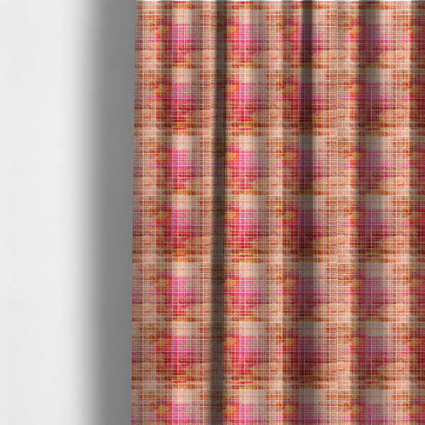 The fabric used to create these made-to-measure curtains is a fabric features an intricate, layered plaid pattern that blends warm tones of red, orange, yellow, and deep pink. The design has a slightly blurred, watercolour effect with a dense grid of fine white and gold lines overlapping the vibrant colours.