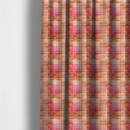 The fabric used to create these made-to-measure curtains is a fabric features an intricate, layered plaid pattern that blends warm tones of red, orange, yellow, and deep pink. The design has a slightly blurred, watercolour effect with a dense grid of fine white and gold lines overlapping the vibrant colours.