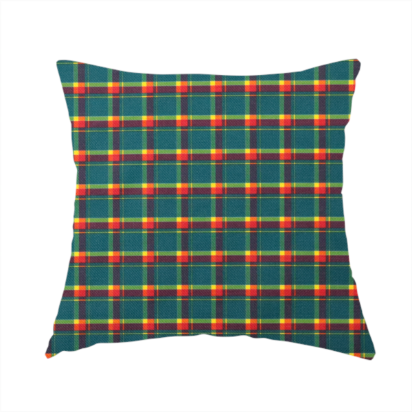The fabric used to create this handmade cushion is a fabric features a woven plaid pattern dominated by a deep teal background, intersected by a structured grid of thin horizontal and vertical lines in bright yellow, orange, and dark burgundy.