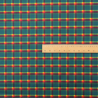 This fabric features a woven plaid pattern dominated by a deep teal background, intersected by a structured grid of thin horizontal and vertical lines in bright yellow, orange, and dark burgundy.