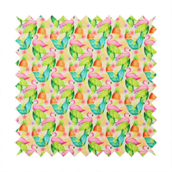 This fabric features a tropical pattern on a light, neutral background, densely decorated with illustrations of bright pink flamingos, pineapples, lush green tropical leaves, and small purple and pink flowers.
