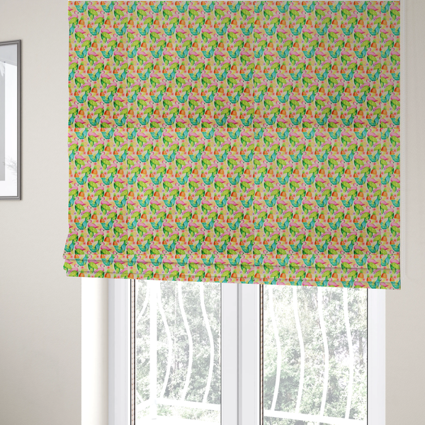 The fabric used to create these Roman blinds is a fabric features a tropical pattern on a light, neutral background, densely decorated with illustrations of bright pink flamingos, pineapples, lush green tropical leaves, and small purple and pink flowers.
