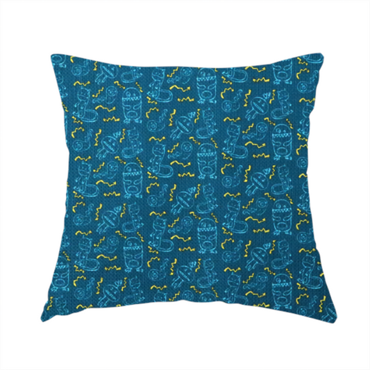 The fabric used to create this handmade cushion is a fabric features a playful, dark teal background covered in a whimsical pattern of small, light blue line-art monsters and yellow zigzagging lightning bolt accents.