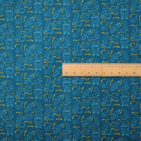This fabric features a playful, dark teal background covered in a whimsical pattern of small, light blue line-art monsters and yellow zigzagging lightning bolt accents.