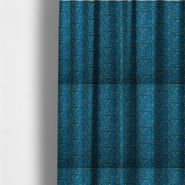 The fabric used to create these made-to-measure curtains is a fabric features a playful, dark teal background covered in a whimsical pattern of small, light blue line-art monsters and yellow zigzagging lightning bolt accents.