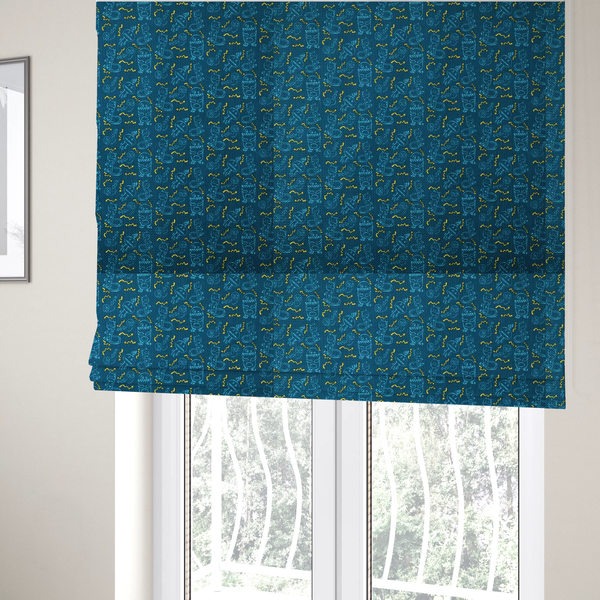 The fabric used to create these Roman blinds is a  fabric features a playful, dark teal background covered in a whimsical pattern of small, light blue line-art monsters and yellow zigzagging lightning bolt accents.