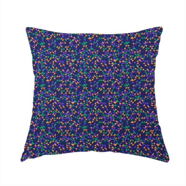 The fabric used to create this handmade cushion is a fabric features a dense geometric pattern of tiny, randomly oriented triangles in shades of purple, green, and orange scattered across a solid dark navy blue background.
