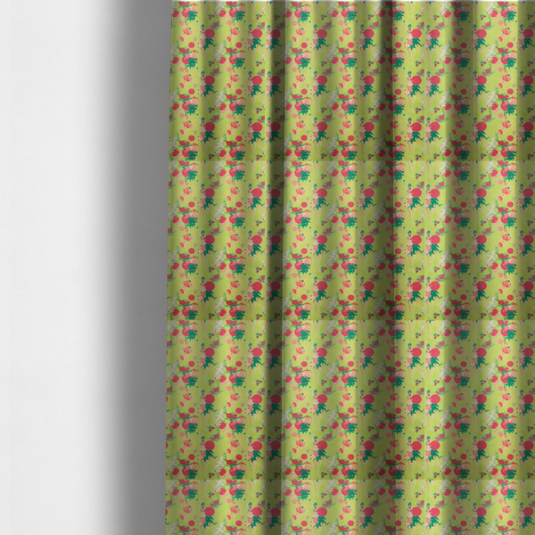 The fabric used to create these made-to-measure curtains is a fabric features a whimsical, Chinoiseries-inspired pattern on a bright chartreuse-green background, repeating illustrations of white cranes, large dark pink pom-pom flowers, and leafy green ferns.