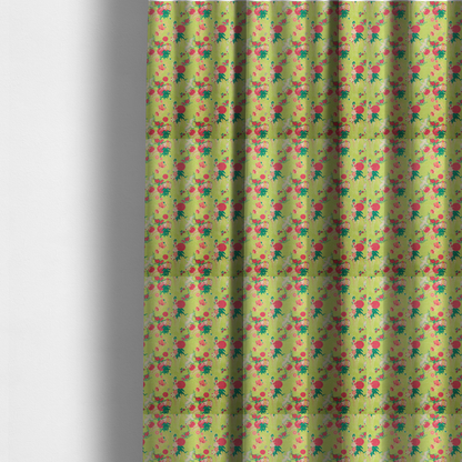 The fabric used to create these made-to-measure curtains is a fabric features a whimsical, Chinoiseries-inspired pattern on a bright chartreuse-green background, repeating illustrations of white cranes, large dark pink pom-pom flowers, and leafy green ferns.