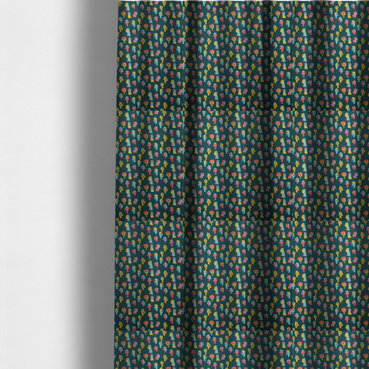 The fabric used to create these made-to-measure curtains is a fabric features a whimsical, repeating pattern on a dark teal background, decorated with stylized, colourful illustrations of diverse human faces in shades of bright yellow, light blue, and coral pink.