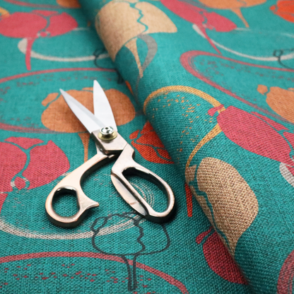 This fabric features a retro-inspired floral pattern on a bright teal background, with repeating motifs of stylized tulips in shades of orange, coral, and beige, interspersed with thin black line-art outlines of tulips and layered circular elements.