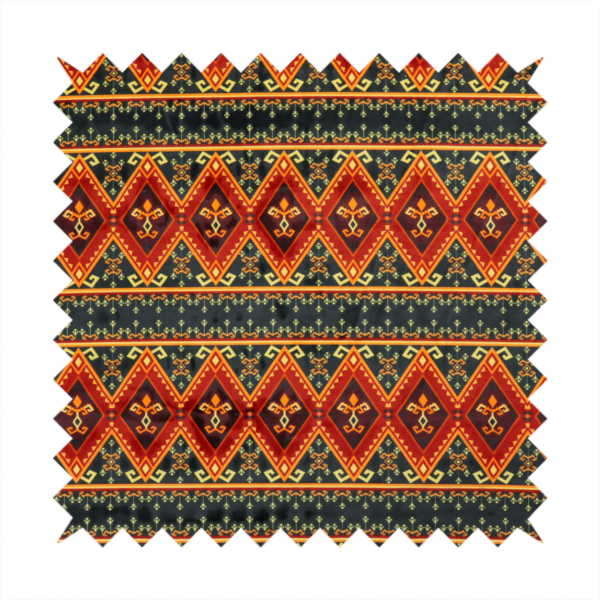 A fabric print featuring a repeating Southwestern geometric pattern. The design consists of horizontal bands with large red, orange, and yellow diamond motifs mixed with thin charcoal black borders detailed with small, delicate yellow tribal symbols.