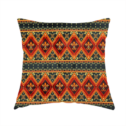 The fabric used to create this handmade cushion is a fabric print featuring a repeating Southwestern geometric pattern. The design consists of horizontal bands with large red, orange, and yellow diamond motifs mixed with thin charcoal black borders detailed with small, delicate yellow tribal symbols.