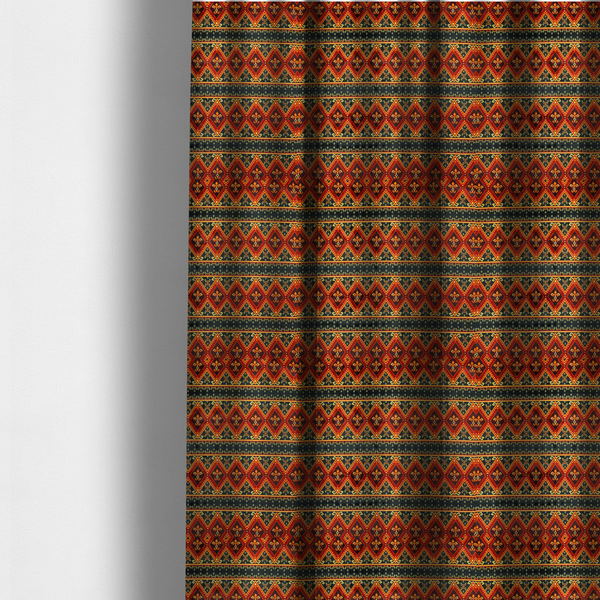 The fabric used to create these made-to-measure curtains is a fabric print featuring a repeating Southwestern geometric pattern. The design consists of horizontal bands with large red, orange, and yellow diamond motifs mixed with thin charcoal black borders detailed with small, delicate yellow tribal symbols.