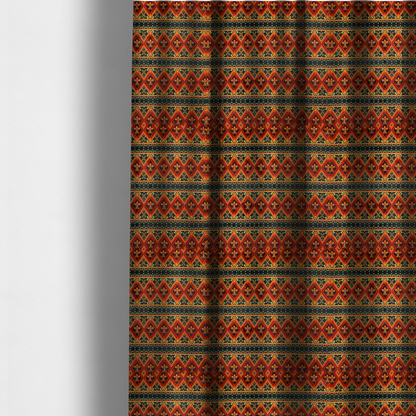 The fabric used to create these made-to-measure curtains is a fabric print featuring a repeating Southwestern geometric pattern. The design consists of horizontal bands with large red, orange, and yellow diamond motifs mixed with thin charcoal black borders detailed with small, delicate yellow tribal symbols.