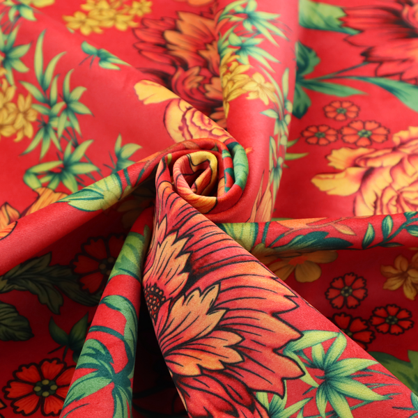 A vibrant red fabric featuring a repeating Chinoiseries floral pattern with large, detailed peony and marigold blossoms in shades of orange and yellow, accented by green leaves and stems.