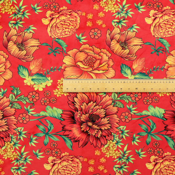 A vibrant red fabric featuring a repeating Chinoiseries floral pattern with large, detailed peony and marigold blossoms in shades of orange and yellow, accented by green leaves and stems.