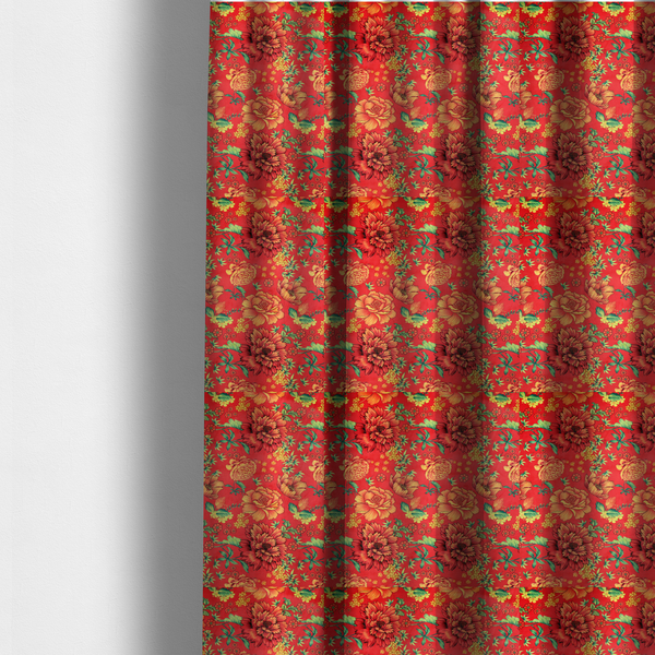 The fabric used to create these made-to-measure curtains is a vibrant red fabric featuring a repeating Chinoiseries floral pattern with large, detailed peony and marigold blossoms in shades of orange and yellow, accented by green leaves and stems.