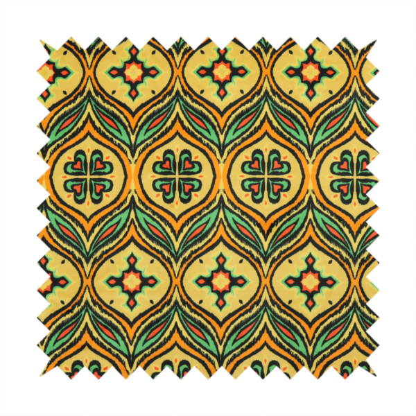 Fabric print featuring a repeating retro ikat ogee pattern. The geometric design displays a lattice of mustard yellow onion arches, green leaf shapes, and four-leaf clover medallions outlined in fuzzy black brushstrokes with pops of coral orange.