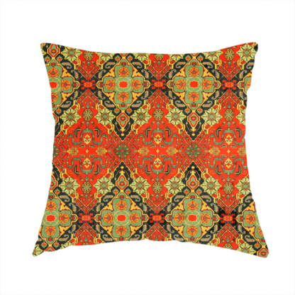 The fabric used to create this handmade cushion is a print featuring an intricate, repeating Persian rug or Moroccan mosaic design. The pattern displays large geometric medallions and scrolling damask shapes in vibrant red, jade green, and warm gold.