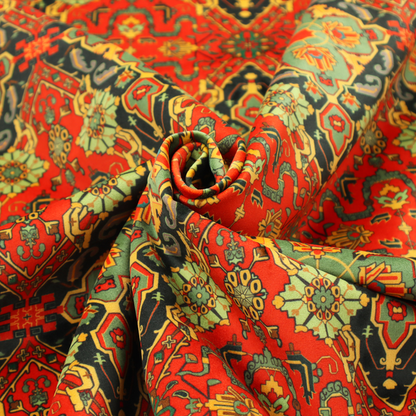 Fabric print featuring an intricate, repeating Persian rug or Moroccan mosaic design. The pattern displays large geometric medallions and scrolling damask shapes in vibrant red, jade green, and warm gold.