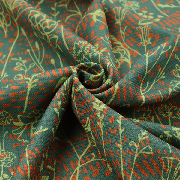 Fabric print featuring a whimsical wildflower meadow pattern. The design showcases delicate lime-green line art sketches of slender stems and blossoms over a deep teal-green background layered with small, textured terracotta orange dashes.