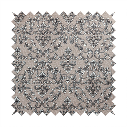 Fabric featuring a repeating traditional damask pattern in white and dark grey outlines over a textured, light taupe background.