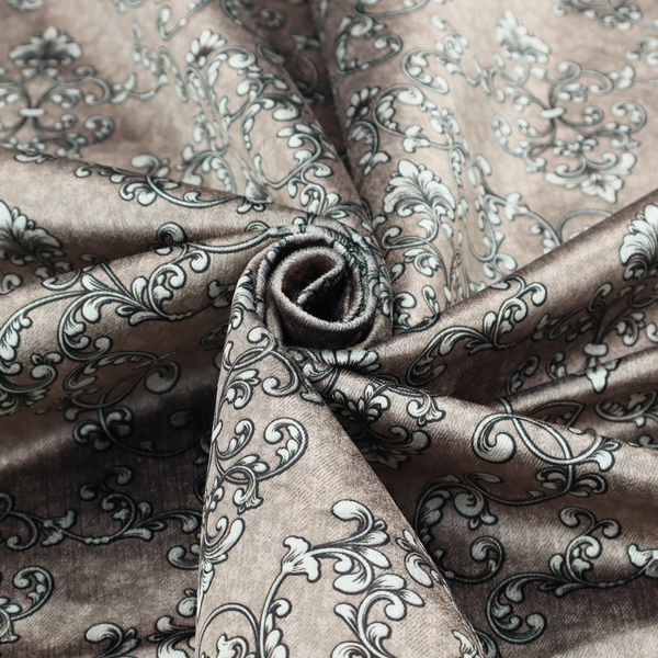 Fabric featuring a repeating traditional damask pattern in white and dark grey outlines over a textured, light taupe background.