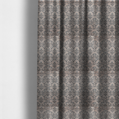 The fabric used to create these made-to-measure curtains is featuring a repeating traditional damask pattern in white and dark grey outlines over a textured, light taupe background.