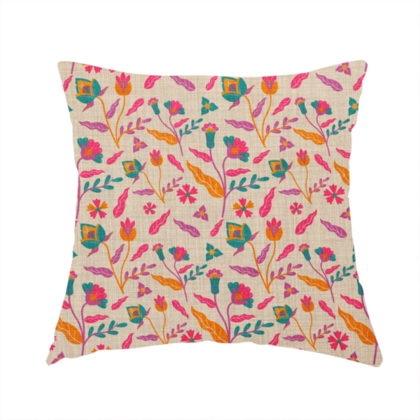 The fabric used to create this handmade cushion is featuring a vibrant, repeating floral pattern with pink, orange, and teal blossoms and leaves on a neutral, linen-textured beige background.