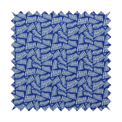 Fabric featuring a vibrant, repeating geometric pattern of light grey, abstract leaf or comb-like blocks closely packed on a royal blue background.