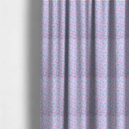 The fabric used to create these made-to-measure curtains is featuring a repeating pattern of sketched, line-art leaves and butterflies in pastel pink and light blue on a pale grey background.