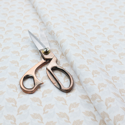 Fabric featuring a subtle, repeating pattern of delicate, stylized floral vine stems in muted beige and light grey tones on a soft white background.