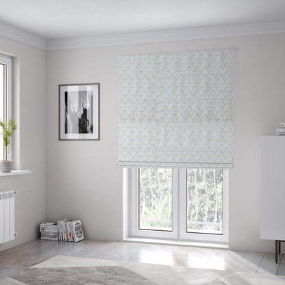 The fabric used to create these Roman blinds is featuring a subtle, repeating pattern of delicate, stylized floral vine stems in muted beige and light grey tones on a soft white background.