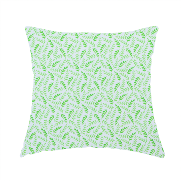 The fabric used to create this handmade cushion is featuring a dense, repeating pattern of small, vibrant lime green leafy sprigs and fern-like fronds on a crisp white background.