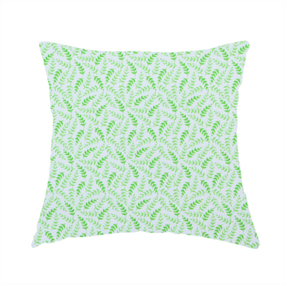 The fabric used to create this handmade cushion is featuring a dense, repeating pattern of small, vibrant lime green leafy sprigs and fern-like fronds on a crisp white background.