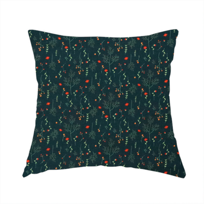 The fabric used to create this handmade cushion is a dark forest green fabric featuring a delicate, scattered botanical print. The pattern includes fine, wispy light green twigs, tiny light green leaves, and small, vibrant red wildflowers and buds spread evenly across the textured dark background.