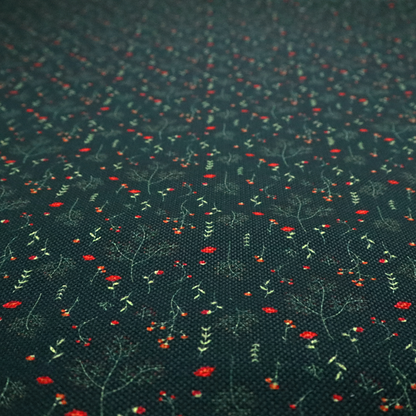 Dark forest green fabric featuring a delicate, scattered botanical print. The pattern includes fine, wispy light green twigs, tiny light green leaves, and small, vibrant red wildflowers and buds spread evenly across the textured dark background.