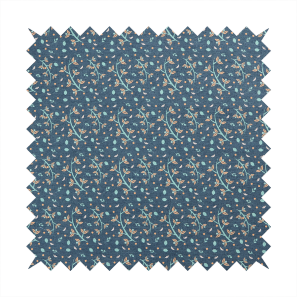 Slate blue textured fabric with a delicate ditsy botanical print. The repeating pattern features thin, curved mint green vine stems with small peach-coloured leaves, surrounded by tiny scattered peach polka dots and miniature teal leaf accents throughout the design.