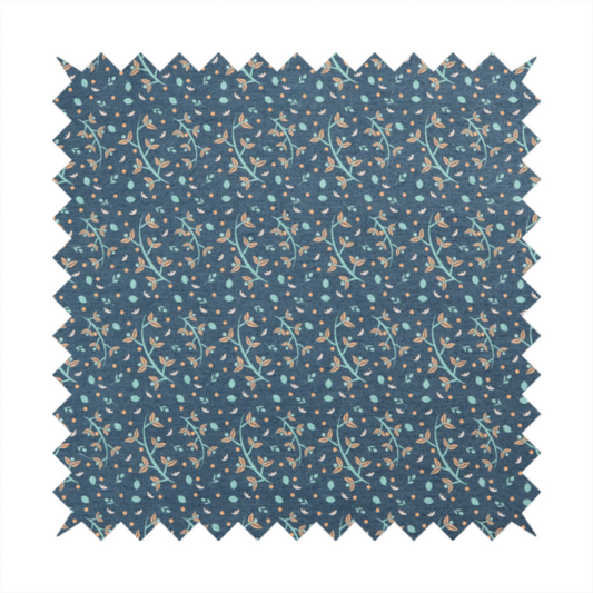 Slate blue textured fabric with a delicate ditsy botanical print. The repeating pattern features thin, curved mint green vine stems with small peach-coloured leaves, surrounded by tiny scattered peach polka dots and miniature teal leaf accents throughout the design.