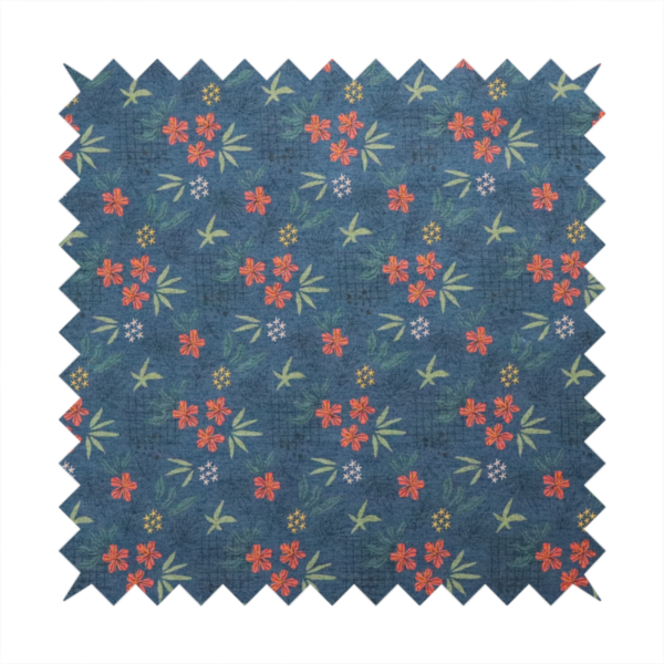 Deep teal blue fabric featuring a subtle crosshatch texture and a tropical botanical print. The repeating pattern showcases clusters of small rust-coral flowers, sage green palm fronds, and scattered miniature yellow starburst blooms.
