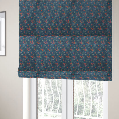 The fabric used to create these Roman blinds is a deep teal blue fabric featuring a subtle crosshatch texture and a tropical botanical print. The repeating pattern showcases clusters of small rust-coral flowers, sage green palm fronds, and scattered miniature yellow starburst blooms.