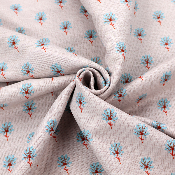 Light pink textured canvas fabric featuring a dainty, minimalist ditsy floral print. The pattern consists of neat, repeating rows of tiny cornflower blue wildflowers with slender reddish-brown stems spread evenly across the soft pastel background.
