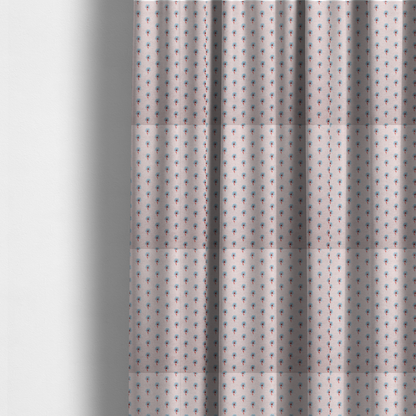 The fabric used to create these made-to-measure curtains is a light pink textured canvas fabric featuring a dainty, minimalist ditsy floral print. The pattern consists of neat, repeating rows of tiny cornflower blue wildflowers with slender reddish-brown stems spread evenly across the soft pastel background.