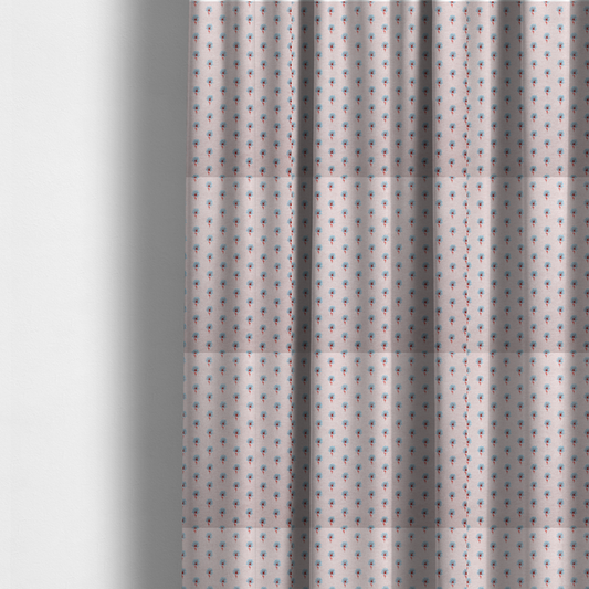 The fabric used to create these made-to-measure curtains is a light pink textured canvas fabric featuring a dainty, minimalist ditsy floral print. The pattern consists of neat, repeating rows of tiny cornflower blue wildflowers with slender reddish-brown stems spread evenly across the soft pastel background.