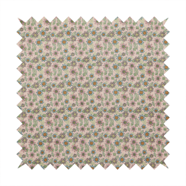 Textured dusty blush pink fabric with a dense retro calico print. The intricate pattern features small, sketch-style daisies with mustard yellow centres and blue-teal petals, mixed with pink blooms and delicate sage green leaves spread tightly across the surface.