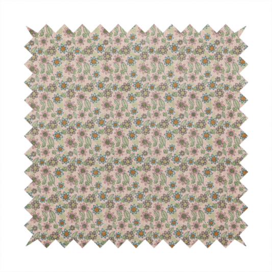 Textured dusty blush pink fabric with a dense retro calico print. The intricate pattern features small, sketch-style daisies with mustard yellow centres and blue-teal petals, mixed with pink blooms and delicate sage green leaves spread tightly across the surface.