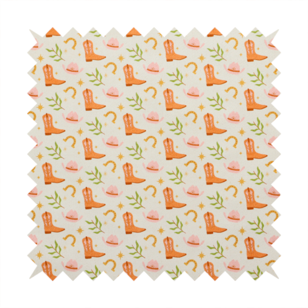 A repeating pattern of cowboy-themed illustrations on a cream-coloured fabric backdrop. The design features light orange cowboy boots, pale pink cowboy hats, golden horseshoes, small green leafy sprigs, and delicate four-pointed stars scattered throughout.