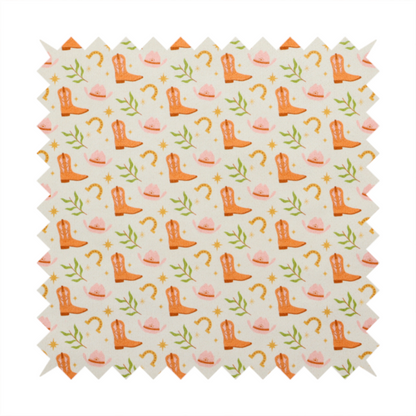 A repeating pattern of cowboy-themed illustrations on a cream-coloured fabric backdrop. The design features light orange cowboy boots, pale pink cowboy hats, golden horseshoes, small green leafy sprigs, and delicate four-pointed stars scattered throughout.